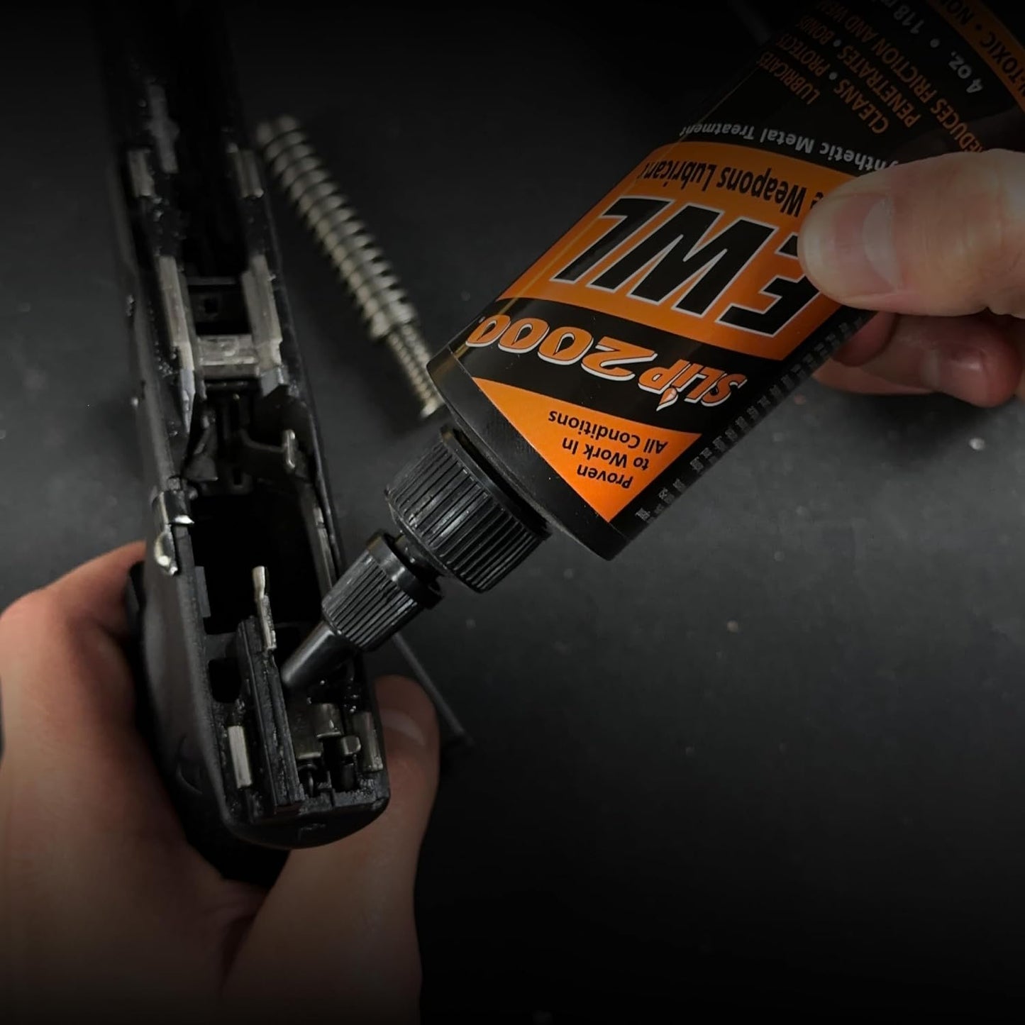 SLIP 2000 EWL CLP Gun Lube - Extreme Weapons Lubricant Synthetic Gun CLP Cleaner - 4 oz Squeeze Bottle | Cleans, protects and lubricates machine guns and chain guns