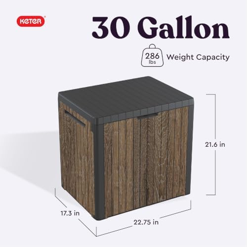 keter premium everwood 30 gal outdoor storage box shown in use
