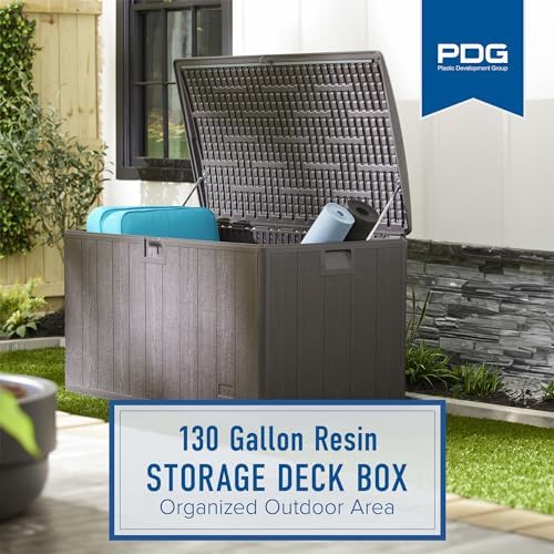 plastic development group outdoor deck box, soft close shown in use