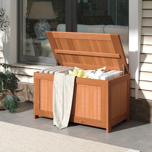 happygrill outdoor wood deck box with flip top shown in use