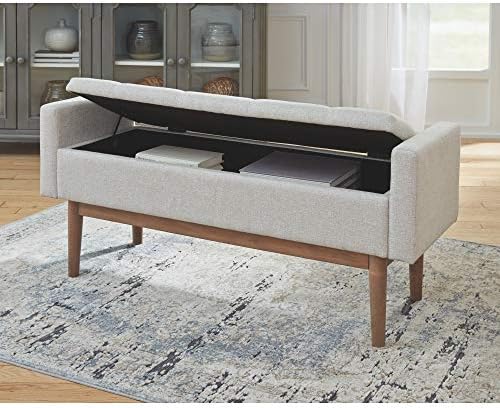 signature design by ashley upholstered bench with storage on a desk or shelf