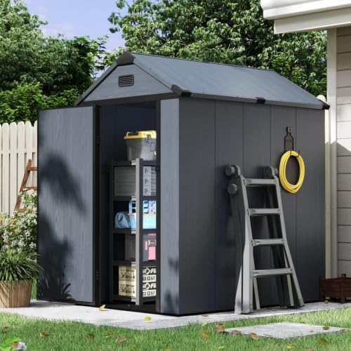 aoxun 4×6 ft all-weather resin storage shed, dark shown in use