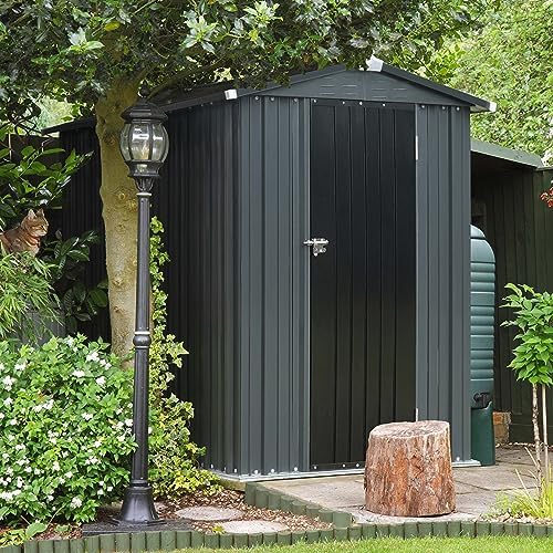mupater 4 x 4 ft outdoor storage shed on a desk or shelf