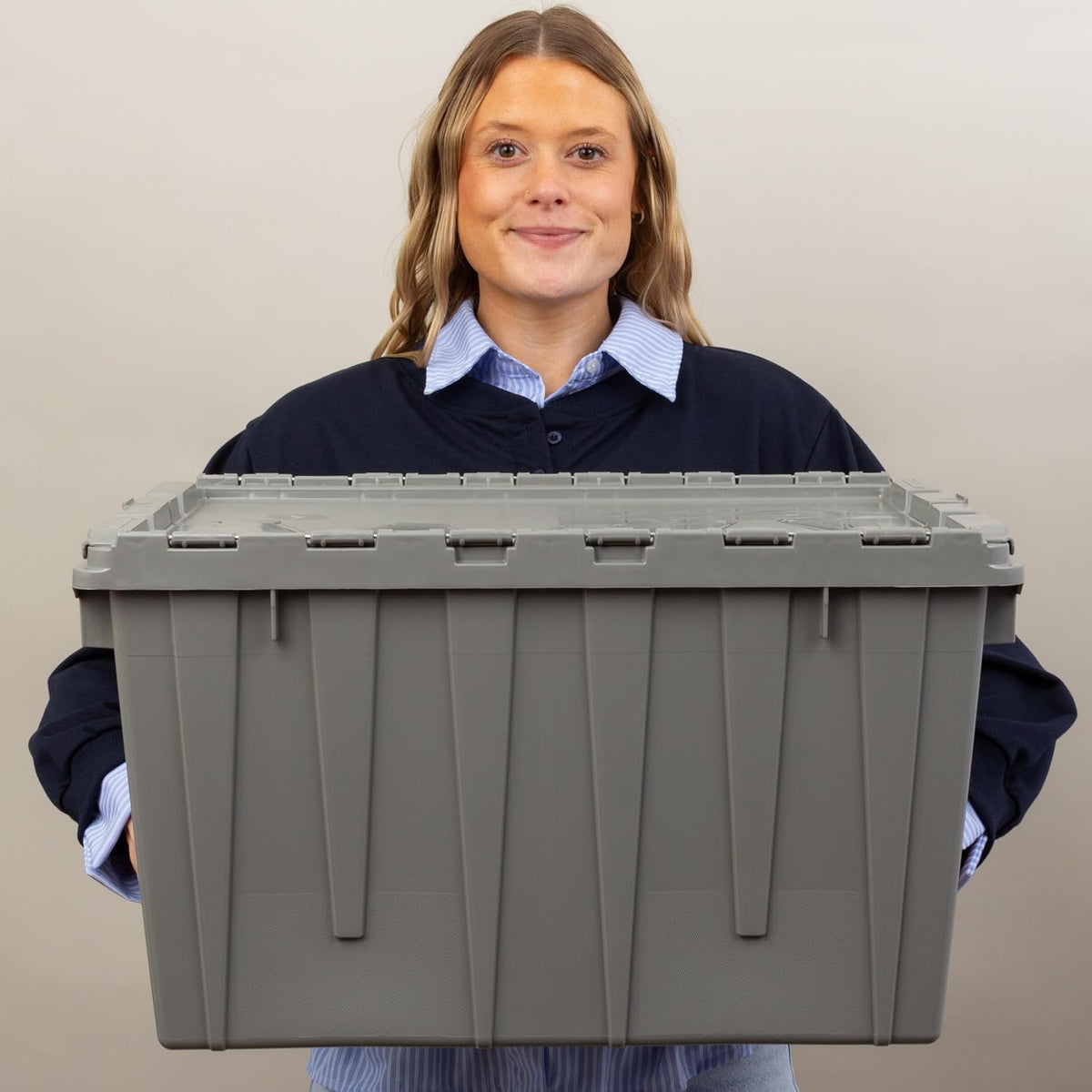 buckhorn 12g industrial plastic storage container, lid attached shown in use